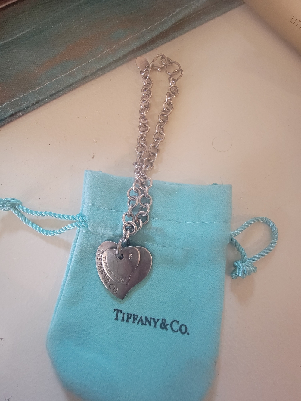 Vintage Tiffany & Co. Double Interlocking Silver Heart  Charms with  Blue Pouch